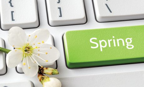 Keyboard with a green button that says spring