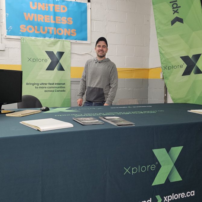 Authorized Xplore Dealer, Derek at his trade show booth